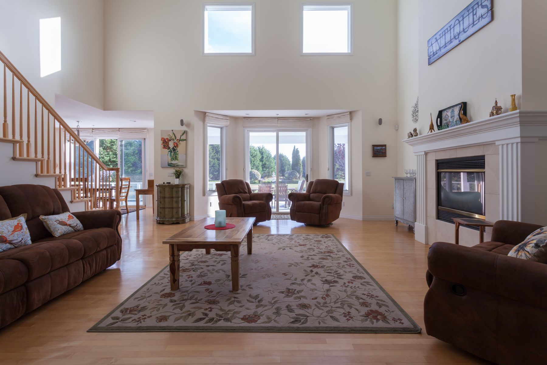 Two-story living room with fireplace